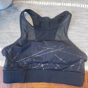 Woman’s size medium black Zyia active sports bra